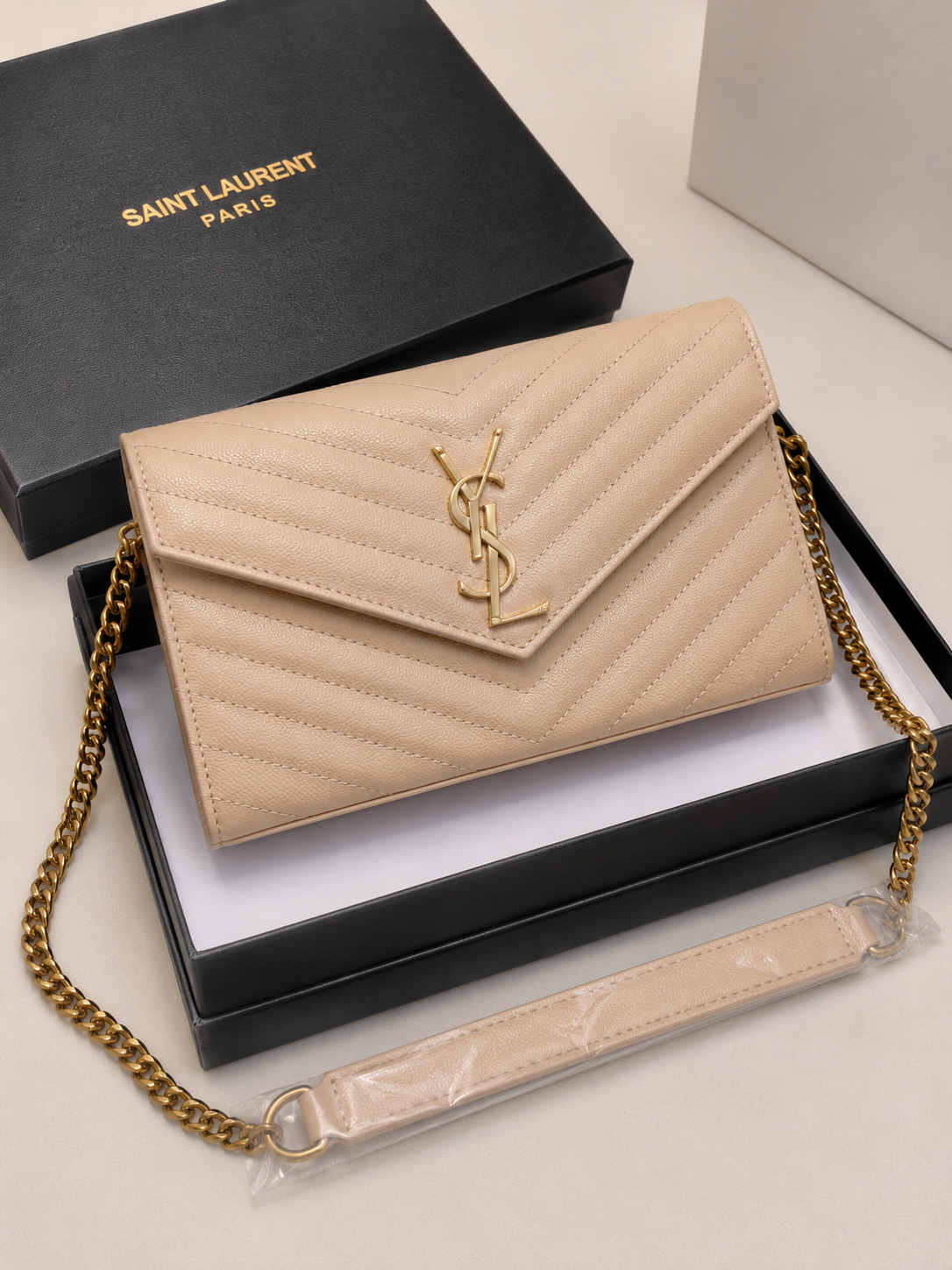 Yves saint Laurent sac à main - cassandre beige logo or